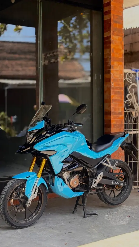 Honda CB150X — bright blue custom bodywork